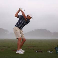 ORLANDO, FLORIDA - MARCH 01: Scottie Scheffler of the USA warms up on a foggy driving range before the pro-am prior to the Arnold Palmer Invitational presented by Mastercard at Arnold Palmer Bay Hill Golf Course on March 01, 2023 in Orlando, Florida. (Photo by Richard Heathcote/Getty Images)