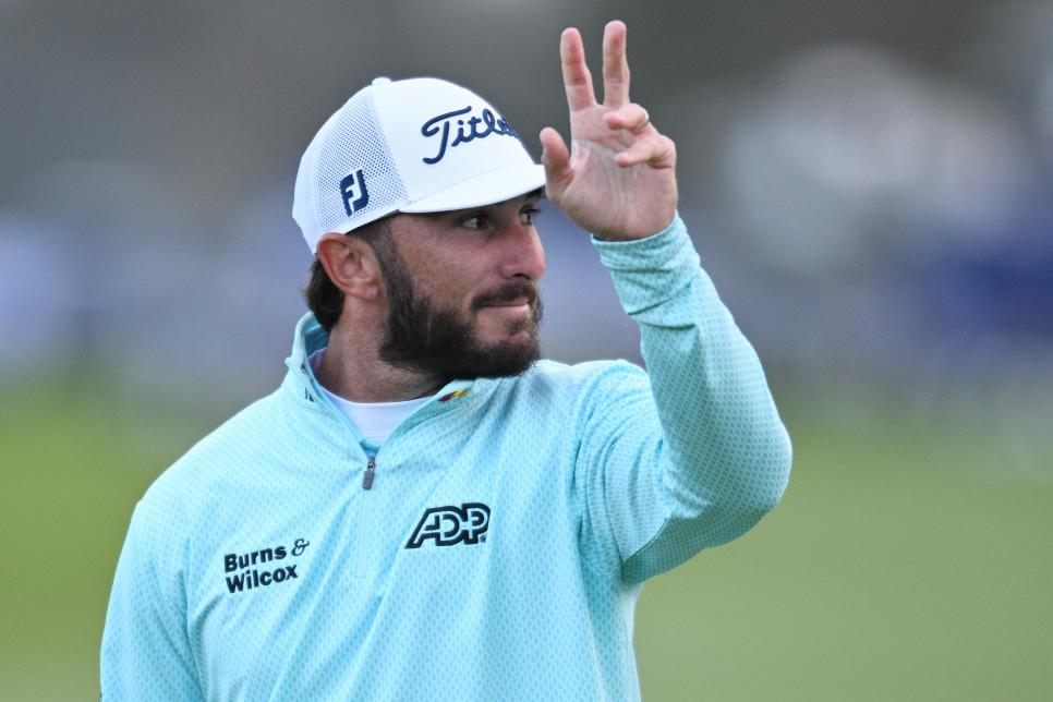 LA JOLLA, CALIFORNIA - JANUARY 28: Max Homa of the United States acknowledges the crowd after a putt on the 18th green during the final round of the Farmers Insurance Open on the South Course of Torrey Pines Golf Course on January 28, 2023 in La Jolla, California. (Photo by Orlando Ramirez/Getty Images)