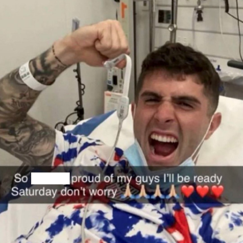 Christian Pulisic celebrating the USMNT’s big win from the hospital after getting his you-know-whats crushed is what America is all about