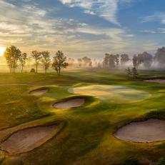 Sunrise on a misty and mystical morning at The Loop at Forest Dunes.  This view is looking back over the 12th green on the Black Course which also serves at the 6th green of the Red Course.  A wonderful reversible golf course designed by tom doak.