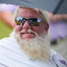 NEW ORLEANS, LA - APRIL 21: John Daly of the United States takes a break in between holes at the 18th tee box during Round Two of the Zurich Classic of New Orleans at TPC Louisiana on April 21, 2023 in New Orleans, Louisiana. (Photo by Jason Allen/ISI Photos/Getty Images).