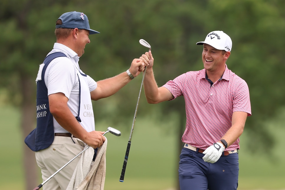 ARLINGTON, TEXAS - APRIL 25: Zach James of the United States celebrates with his caddie after playing a shot on the eighteenth hole during the continuation of the first round of the Veritex Bank Championship 2025 at Texas Rangers Golf Club on April 25, 2025 in Arlington, Texas. (Photo by Sam Hodde/Getty Images)