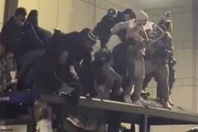 WATCH: Eagles Fans Fall Through Bus Stop Roof