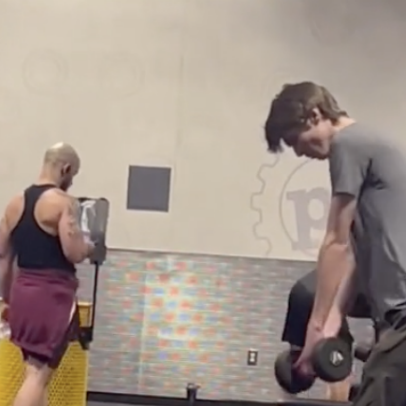 Planet Fitness genius practices putting with weights; is this the future of golf fitness?