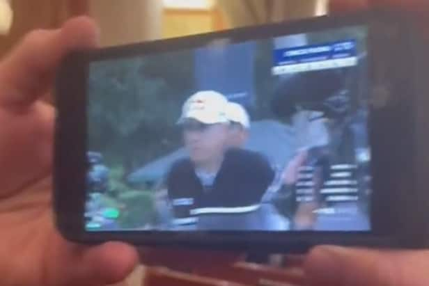 iconic-dad-finds-new-way-to-watch-golf-while-at-wedding