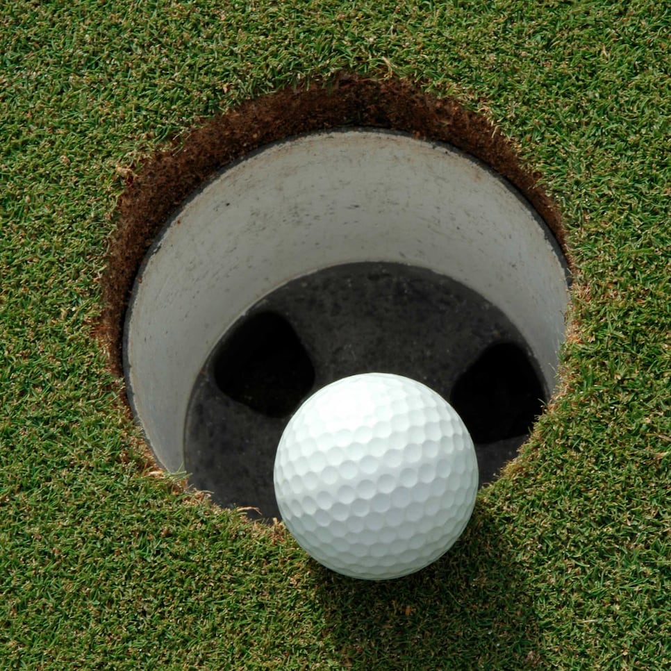 Golf Ball Near Hole