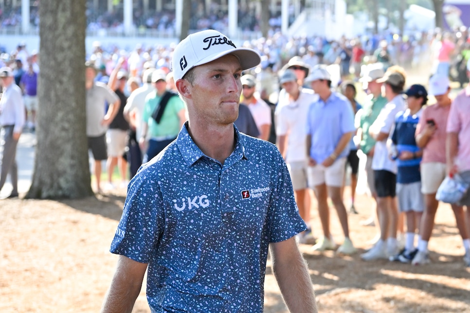 MEMPHIS, TENNESSEE - AUGUST 14: Will Zalatoris prepares to his his second shot near the fence along the 18th hole during the second playoff hole during the first playoff hole during the final round of the FedEx St. Jude Championship at TPC Southwind on August 14, 2022 in Memphis, Tennessee. (Photo by Ben Jared/PGA TOUR via Getty Images)