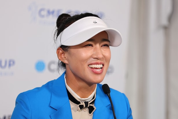 the-smiley-face-stitched-on-amy-yang’s-visor-comes-with-its-own-inspiring-story