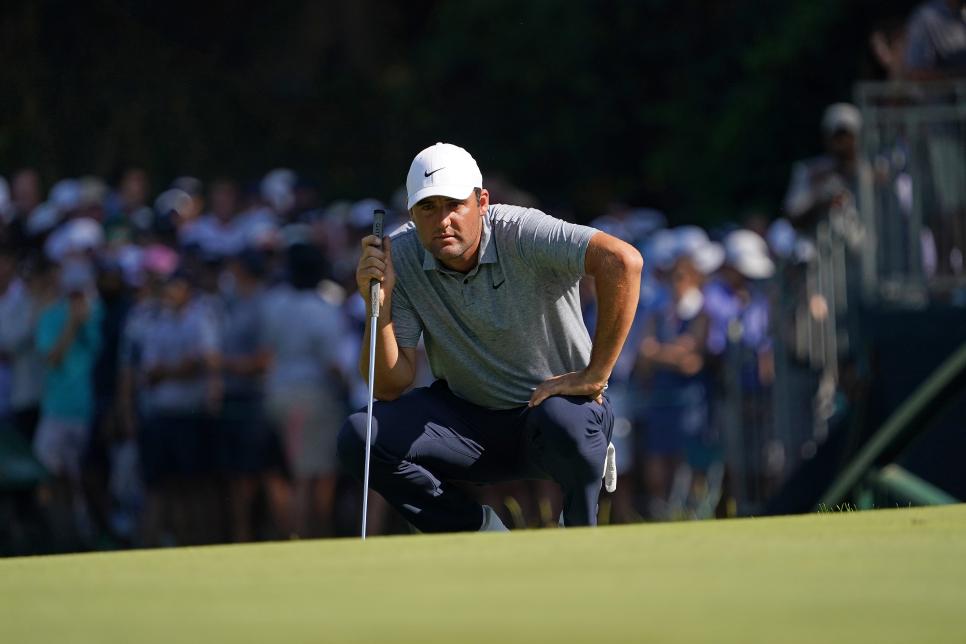 OLYMPIA FIELDS, ILLINOIS - AUGUST 19: Scottie Scheffler of the United States lines up a putt on the 16th green during the third round of the BMW Championship at Olympia Fields Country Club on August 19, 2023 in Olympia Fields, Illinois. (Photo by Dylan Buell/Getty Images)