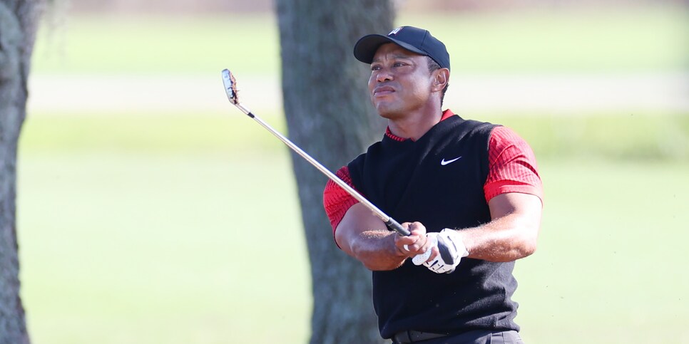 ORLANDO, FLORIDA - DECEMBER 18:  Tiger Woods of the United States plays a shot on the 11th hole during the final round of the PNC Championship at Ritz-Carlton Golf Club on December 18, 2022 in Orlando, Florida. (Photo by Mike Ehrmann/Getty Images)