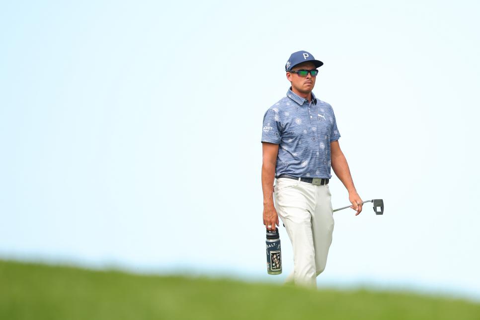 CROMWELL, CONNECTICUT - JUNE 22: Rickie Fowler of the United States walks down the 14th hole during the first round of the Travelers Championship at TPC River Highlands on June 22, 2023 in Cromwell, Connecticut. (Photo by Stacy Revere/Getty Images)