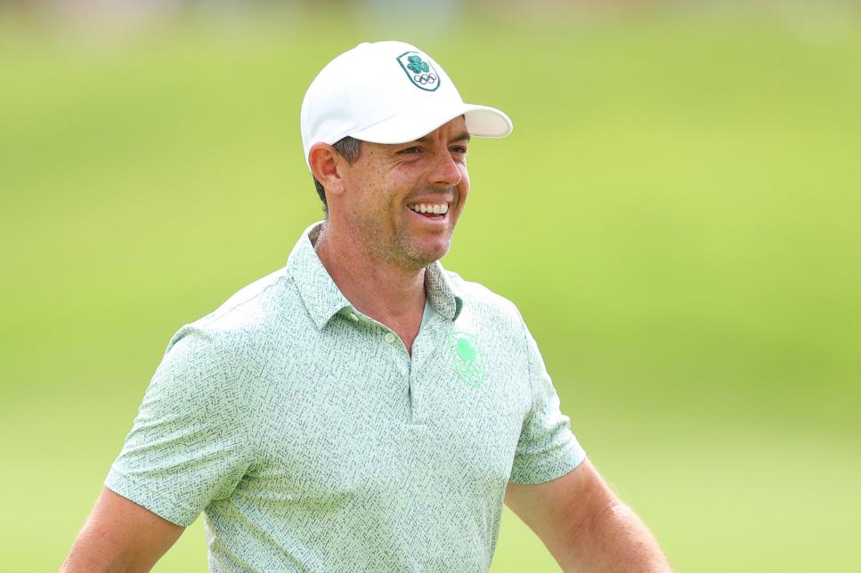 PARIS, FRANCE - AUGUST 03: Rory McIlroy of Team Ireland smiles on the 18th hole during Day Three of the Men's Individual Stroke Play on day eight of the Olympic Games Paris 2024 at Le Golf National on August 03, 2024 in Paris, France. (Photo by Andrew Redington/Getty Images)