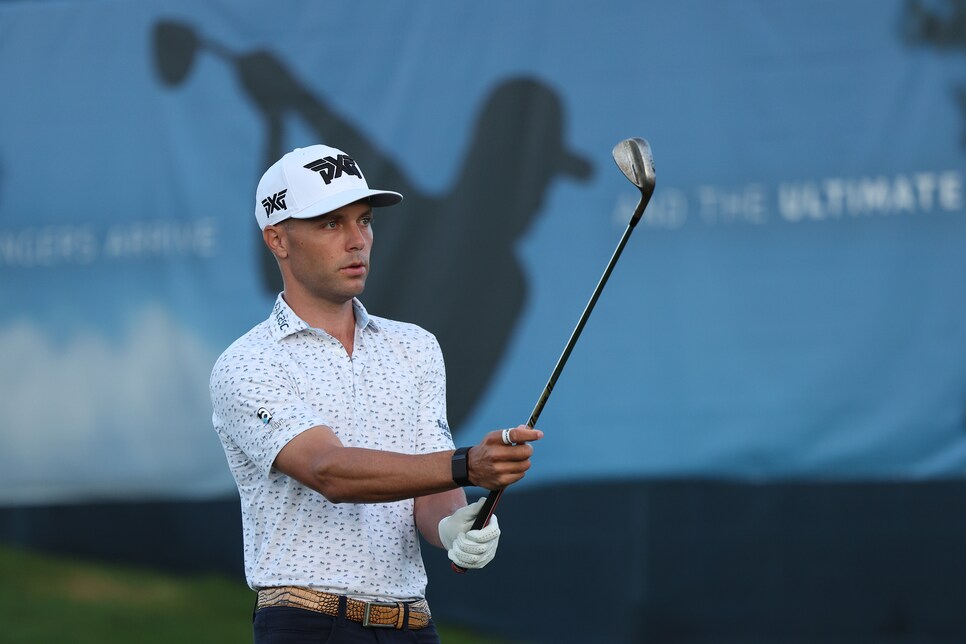 CASTLE ROCK, COLORADO - AUGUST 23:  Eric Cole of the United States warms up on the practice range during the second round of the BMW Championship at Castle Pines Golf Club on August 23, 2024 in Castle Rock, Colorado. (Photo by Harry How/Getty Images)