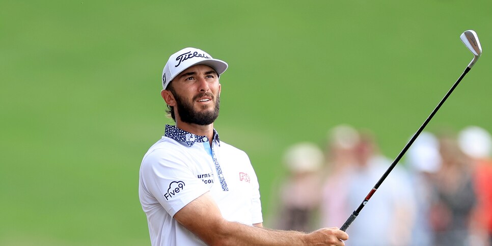 PONTE VEDRA BEACH, FLORIDA - MARCH 12: Max Homa of The United States plays his second shot on the 18th hole during the final round of THE PLAYERS Championship on THE PLAYERS Stadium Course at TPC Sawgrass on March 12, 2023 in Ponte Vedra Beach, Florida. (Photo by David Cannon/Getty Images)