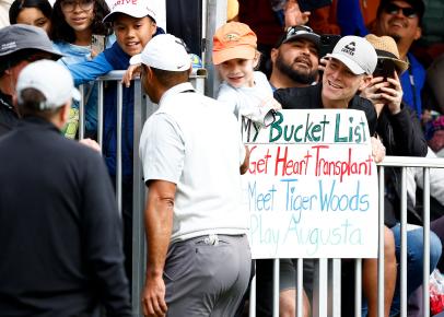 This feel-good story with a 9-year-old girl's poster and Tiger Woods gets even better