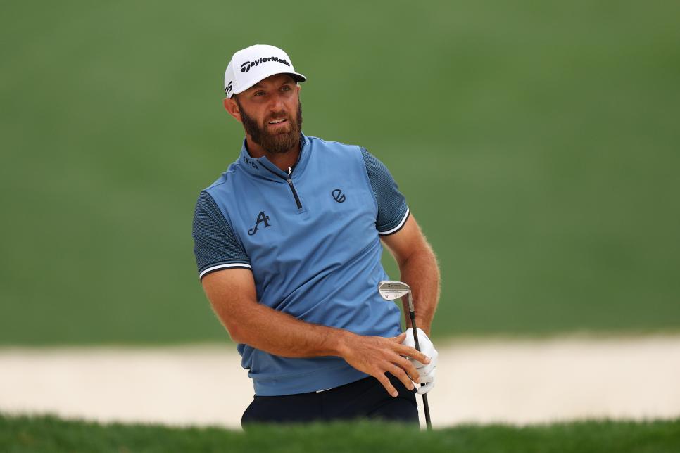 AUGUSTA, GEORGIA - APRIL 03: Dustin Johnson of the United States plays a shot from a bunker on the tenth hole during a practice round prior to the 2023 Masters Tournament at Augusta National Golf Club on April 03, 2023 in Augusta, Georgia. (Photo by Andrew Redington/Getty Images)