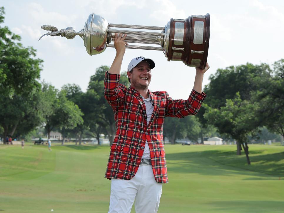 FORT WORTH, TEXAS - MAY 28:  Emiliano Grillo of Argentina poses with the trophy after winning the Charles Schwab Challenge in a playoff at Colonial Country Club on May 28, 2023 in Fort Worth, Texas. (Photo by Jonathan Bachman/Getty Images)