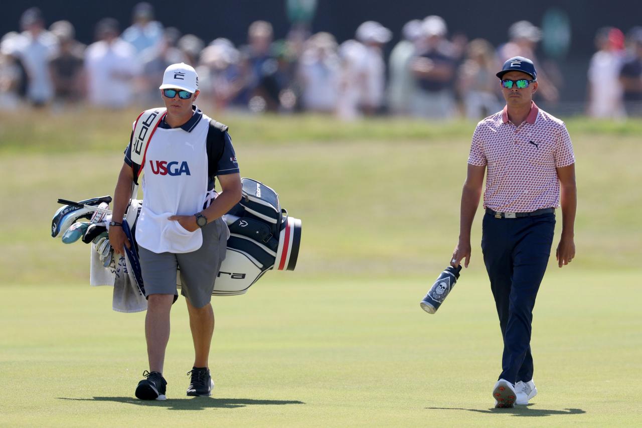 Stickers adorn Rickie Fowler's ever-present water bottle at US Open