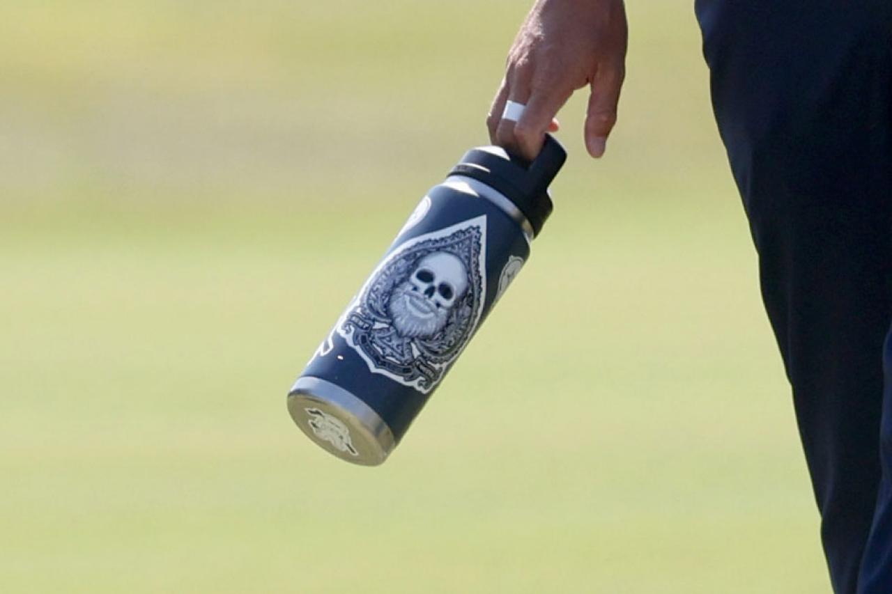 Stickers adorn Rickie Fowler's ever-present water bottle at US Open