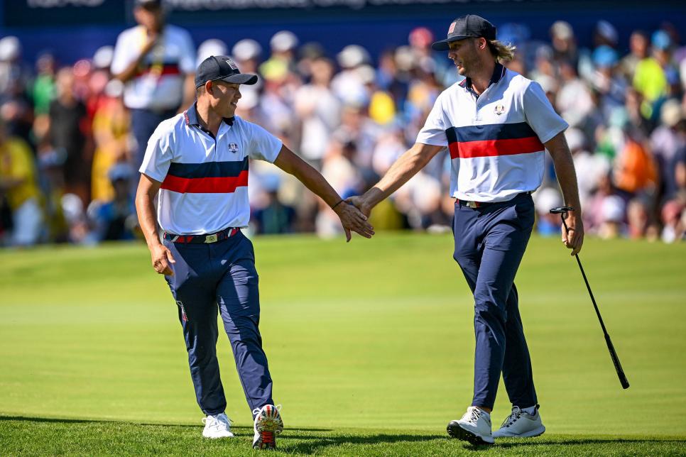 Rome , Italy - 30 September 2023; Sam Burns of USA, right, and partner Xander Schauffele walk off the fifth green during the morning foursomes on day two of the 2023 Ryder Cup at Marco Simone Golf and Country Club in Rome, Italy. (Photo By Ramsey Cardy/Sportsfile via Getty Images)