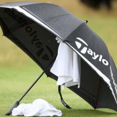 TROON, SCOTLAND - JULY 20: A detailed view of the TaylorMade umbrella of Dustin Johnson of the United States on the second green during day three of The 152nd Open championship at Royal Troon on July 20, 2024 in Troon, Scotland. (Photo by Kevin C. Cox/Getty Images)