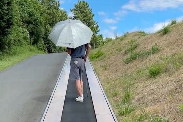 this-yokohama-golf-course-has-moving-walkways-to-combat-hilly-terrain,-japan-continues-living-in-2050