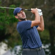 IRVING, TX - APRIL 24: Former NFL player Tony Romo plays his shot from the 13th hole tee during the final round of the ClubCorp Classic at Las Colinas Country Club on April 24, 2022 in Irving, Texas. (Photo by Alex Bierens de Haan/Getty Images)