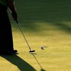 COLOGNE, GERMANY - SEPTEMBER 09:  The shadow of a golfer putting during the pro - am prior to The Mercedes-Benz Championship at The Gut Larchenhof Golf Club on September 9, 2009 in Pulheim, near Cologne, Germany.  (Photo by Stuart Franklin/Getty Images)