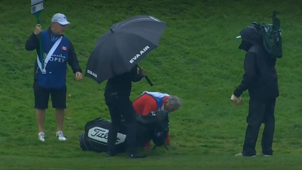 fan-jumps-in-to-caddie-for-ct.-pan-after-mike-(fluff)-cowan-falls-on-course