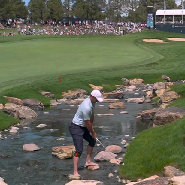 Rory McIlroy hits barefoot shot while standing on rocks after breaking driver shaft on tee box