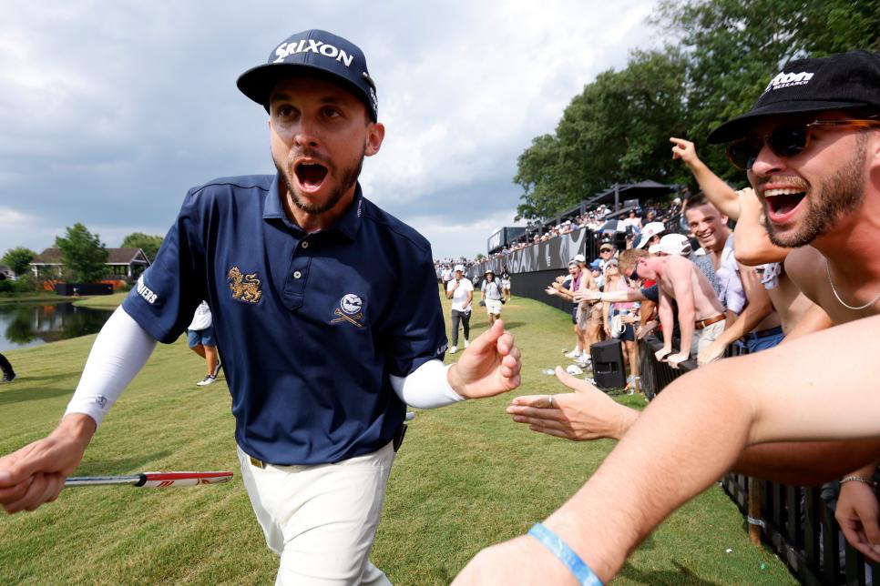 COLLEGE GROVE, TN - JUNE 23: John Catlin (USA) of Crushers GC gives high fives as he runs down the No. 15 party hole during the final round of LIV Golf Nashville, June 23, 2024, at The Grove in College Grove, Tennessee. (Photo by Matthew Maxey/Icon Sportswire via Getty Images)