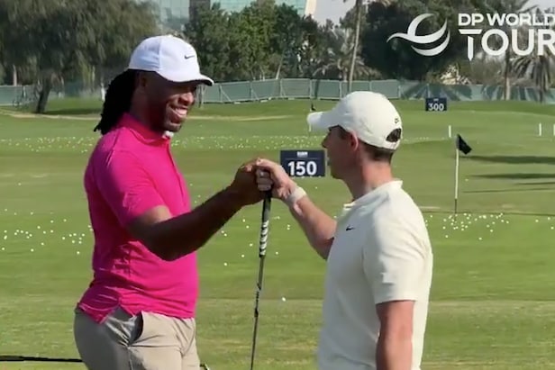 watch-future-hall-of-famer-larry-fitzgerald-get-a-quick-wedge-tip-from-rory-mcilroy-at-the-dubai-invitational