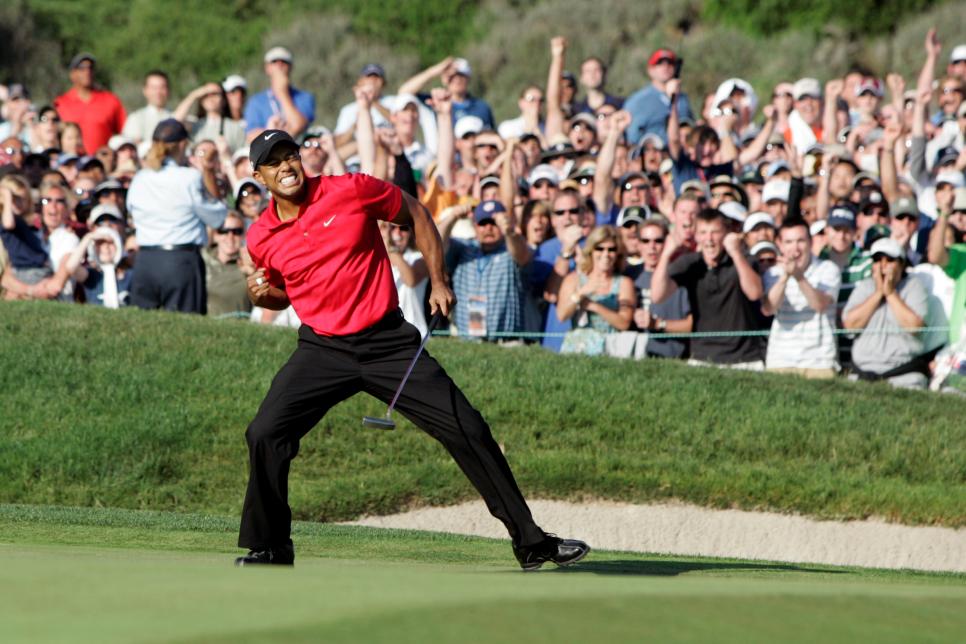15 June 2008: Tiger Woods birdies the 18th hole and celebrates to send it to a playoff round against Rocco Mediate (not pictured) during the final round of the US Open Championship at Torrey Pines South Golf Course in San Diego, CA. (Photo by Charles Baus/Icon Sportswire via Getty Images)