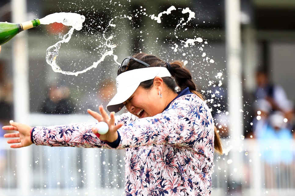 THE WOODLANDS, TEXAS - APRIL 23: Lilia Vu of the United States is sprayed with champagne in celebration of winning on the number 18 first-playoff hole against Angel Yin of the United States during the final round of The Chevron Championship at The Club at Carlton Woods on April 23, 2023 in The Woodlands, Texas. (Photo by Carmen Mandato/Getty Images)