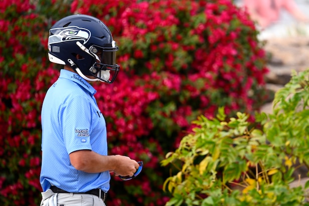 Joel Dahmen entertains Phoenix 16th hole masses by donning Seahawks helmet then chipping in