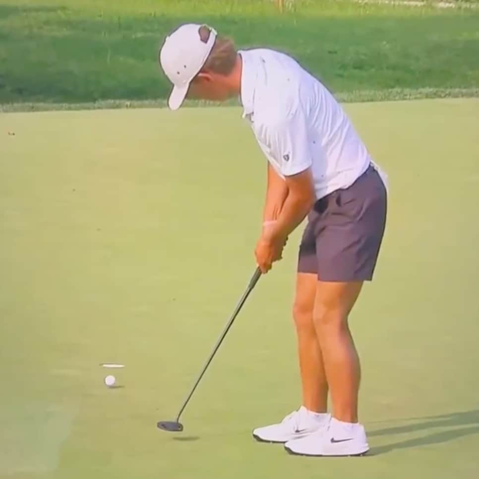 https://www.golfdigest.com/content/dam/images/golfdigest/fullset/2026/8/miles-russell-us-amateur-2026-putt-hitting-ball-marker.jpg