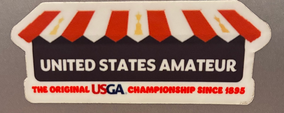 https://www.golfdigest.com/content/dam/images/golfdigest/fullset/2026/8/usga-sticker-us-amateur-bills-burger-stand.jpg