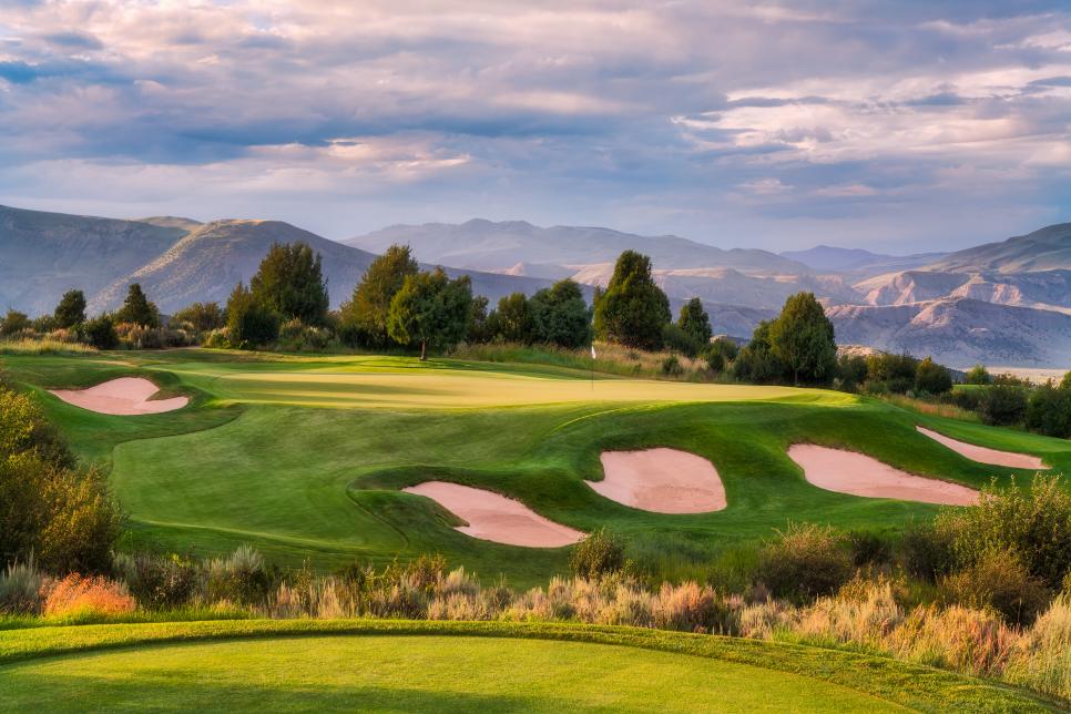Greg Norman's course design captures the essence of the Rockies, offering a natural and visually stunning golf experience in the Vail Valley (source: Golf Digest).