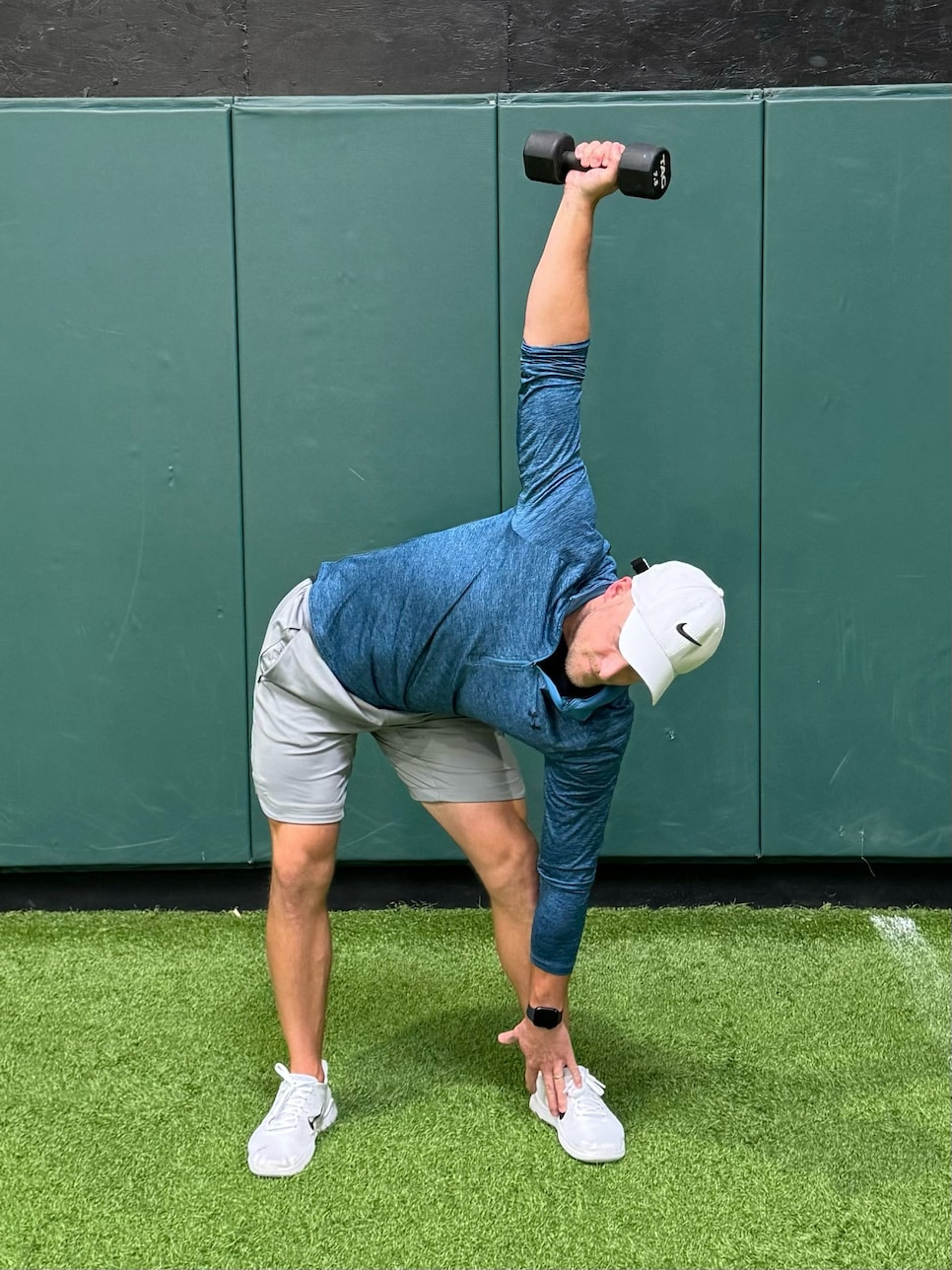 https://www.golfdigest.com/content/dam/images/golfdigest/fullset/fitness-2024/Wagley overhead dumbbell 2.jpg