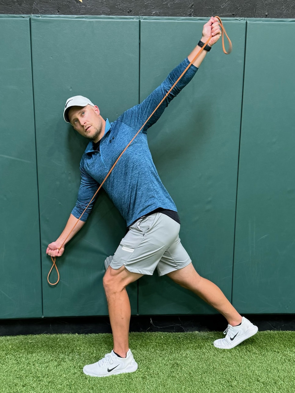 https://www.golfdigest.com/content/dam/images/golfdigest/fullset/fitness-2024/Wagley split stance rotations 2.jpg