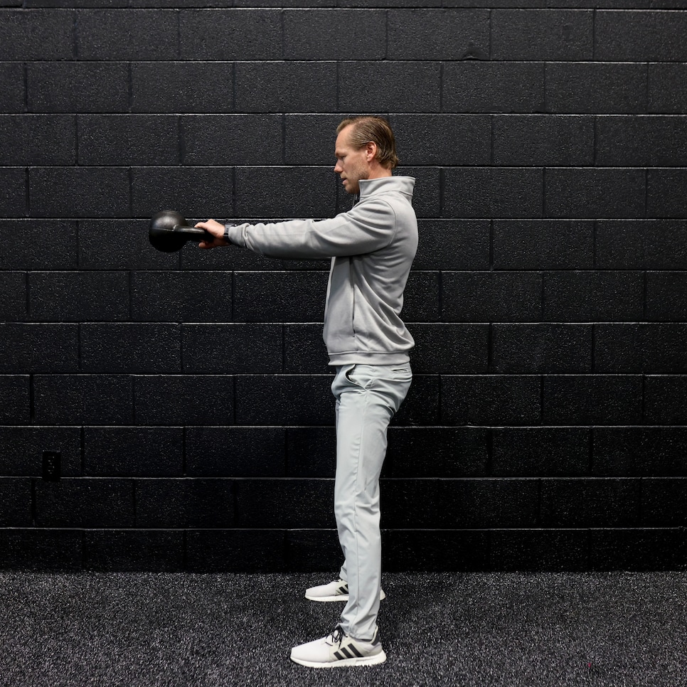 https://www.golfdigest.com/content/dam/images/golfdigest/fullset/fitness-2025/Bosscher kettlebell swings 2.jpg