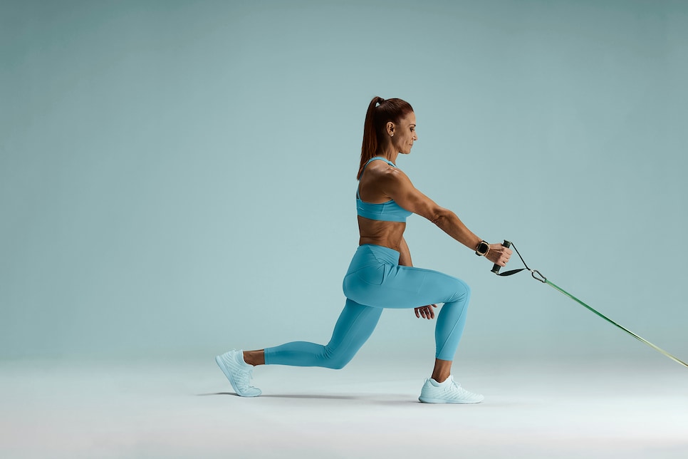 https://www.golfdigest.com/content/dam/images/golfdigest/fullset/fitness-2025/Doddato Cable or banded single arm, split stance low row with torso with retraction twist 1.jpg