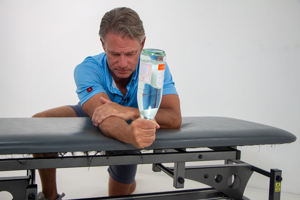 https://www.golfdigest.com/content/dam/images/golfdigest/fullset/fitness-2025/Hellman Supination Finish.jpg