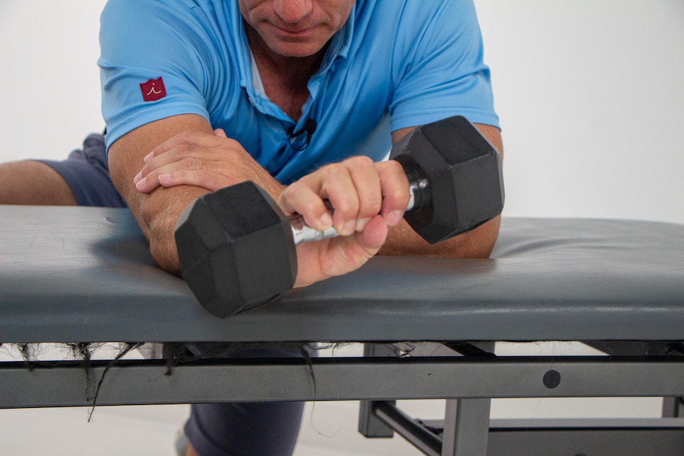 https://www.golfdigest.com/content/dam/images/golfdigest/fullset/fitness-2025/Hellman Wrist Extension Finish.jpg
