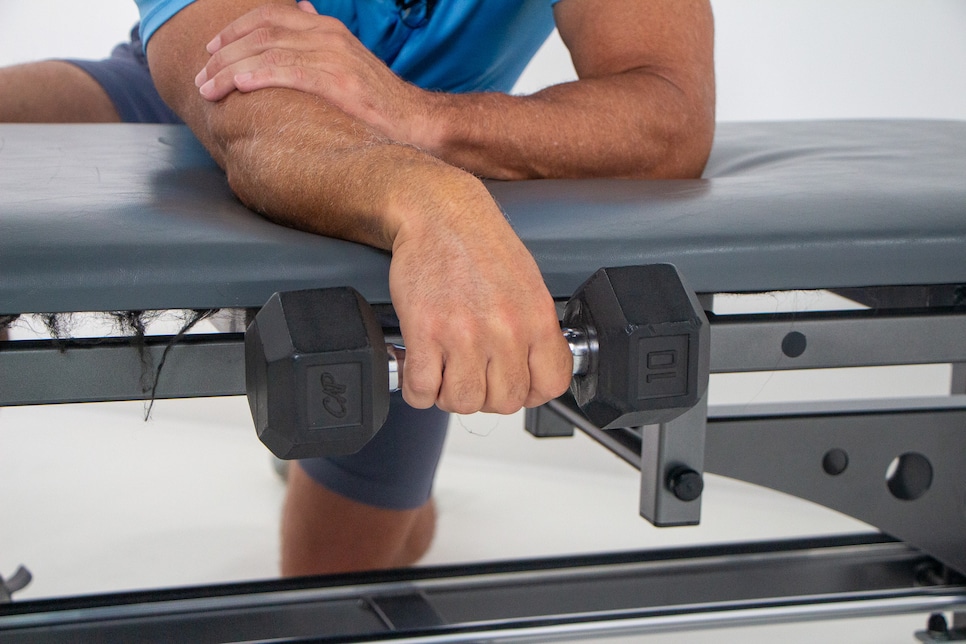 https://www.golfdigest.com/content/dam/images/golfdigest/fullset/fitness-2025/Hellman Wrist Extension Start.jpg