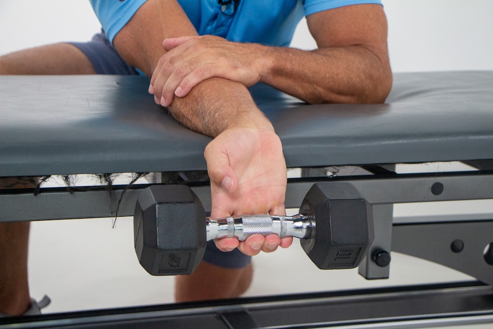 https://www.golfdigest.com/content/dam/images/golfdigest/fullset/fitness-2025/Hellman Wrist Flexion Start.jpg