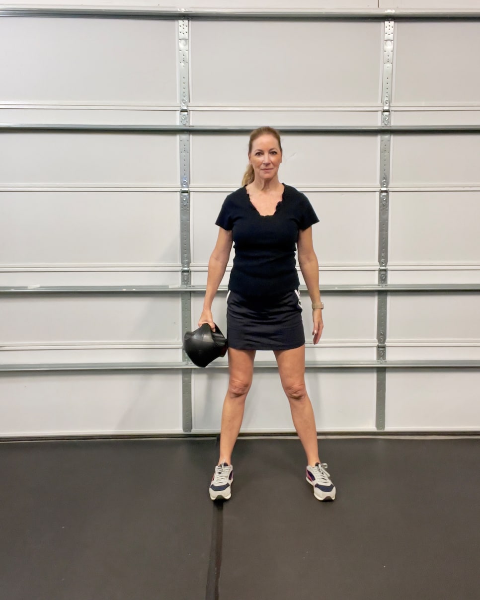 https://www.golfdigest.com/content/dam/images/golfdigest/fullset/fitness-2025/Jansen loaded side flexes with reaches 1.jpeg