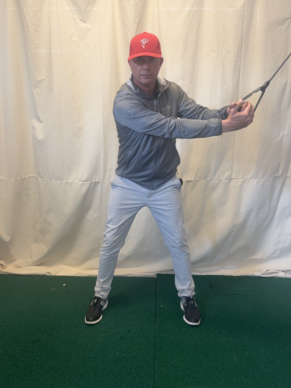 /content/dam/images/golfdigest/fullset/fitness-2026/Chris Cooper high-to-low cable chop 1.jpg