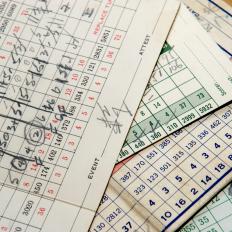 A stack of old golf scorecards.Click here for more golf scorecards in: