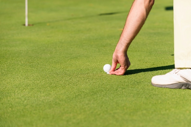 Rules Review: He didn't use a club to move his ball marker. Is that legal?